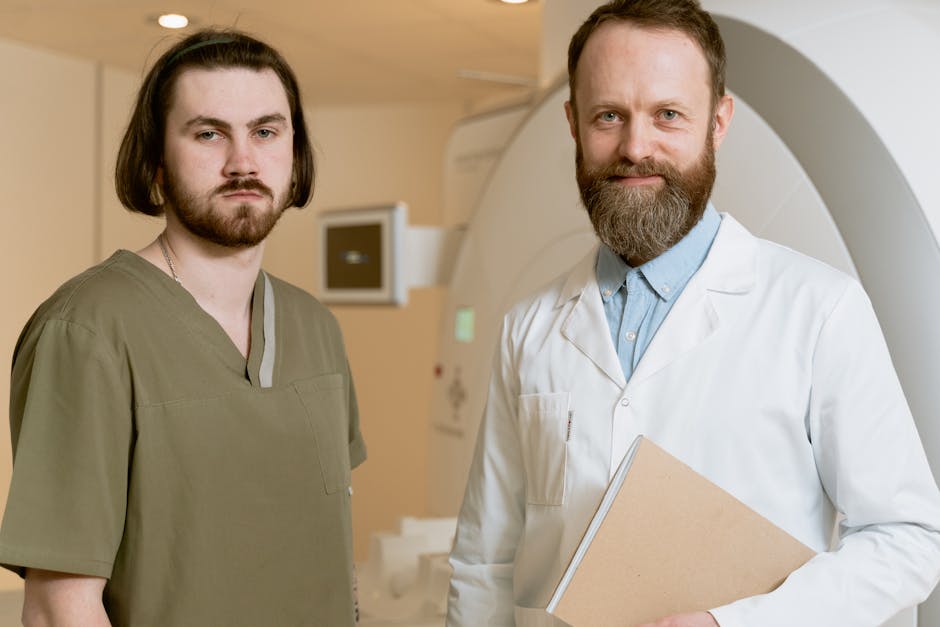 Two male radiologists standing in a medical facility with MRI scanner.
